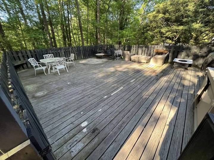 Before: Wood deck pressure washing